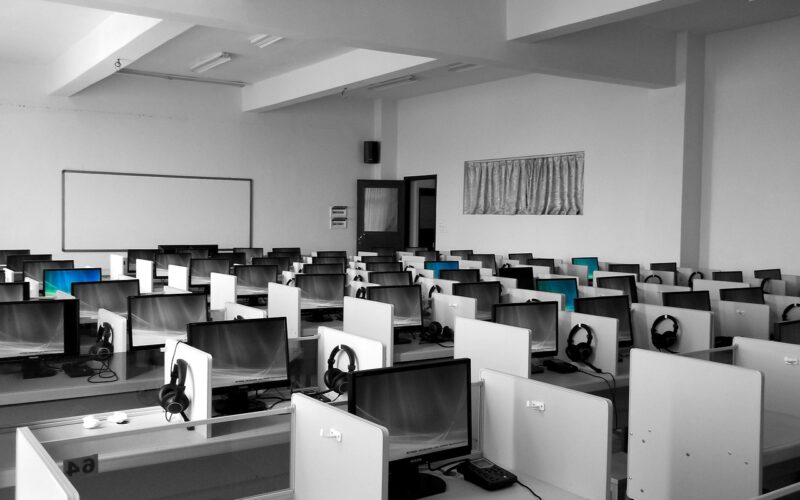 Blank white cubicles with computers reflect Stanford's changing culture as more Stanford grads pursue six-figure stability over innovation.